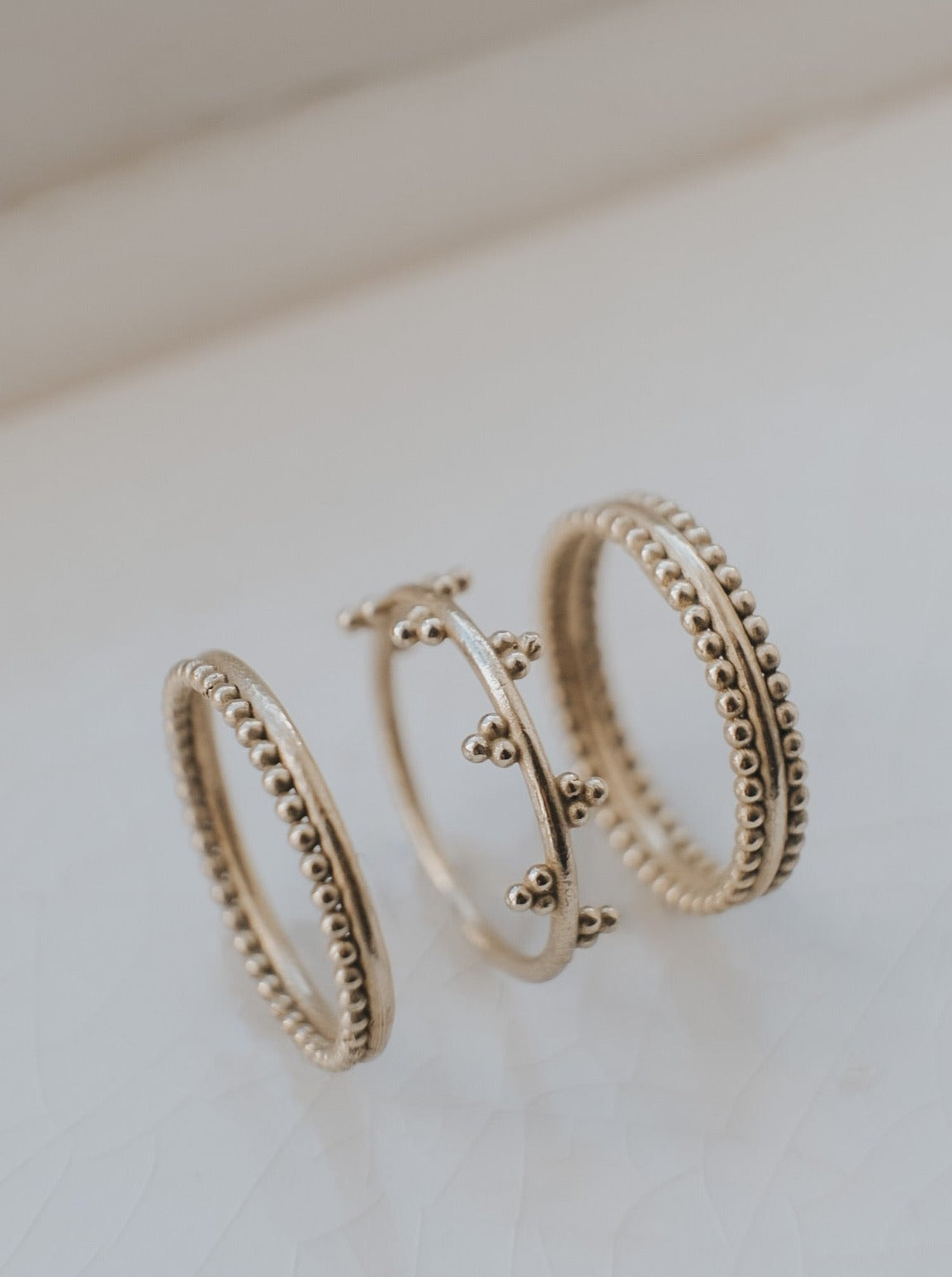 Four 'Crown Ring' stack