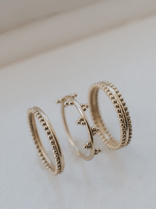 Four 'Crown Ring' stack